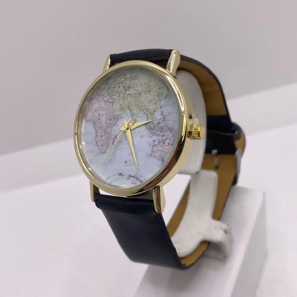 Womens Gold Tone World Map Watch New Battery